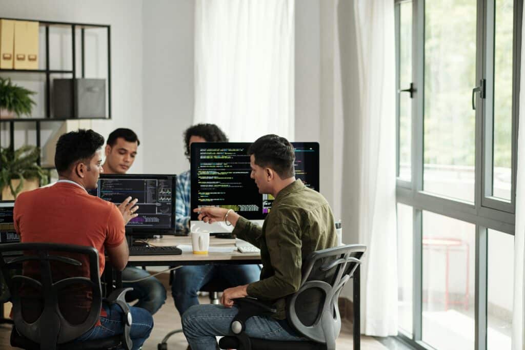 programmer in office working on software